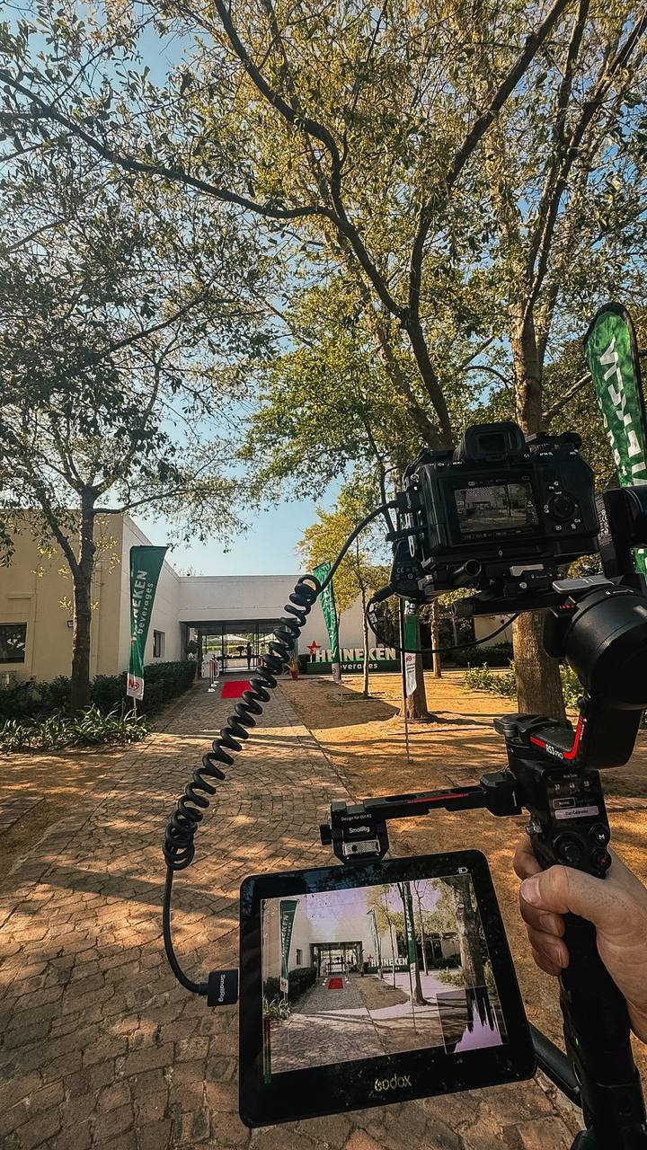 Gimbal and field monitor at a corporate event entrance